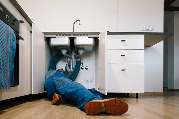 Professional Drain Cleaning technician working in Salina, KS